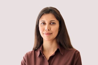 Headshot closeup portrait middle eastern or latin businesswoman, happy smiling young successful woman looking at camera